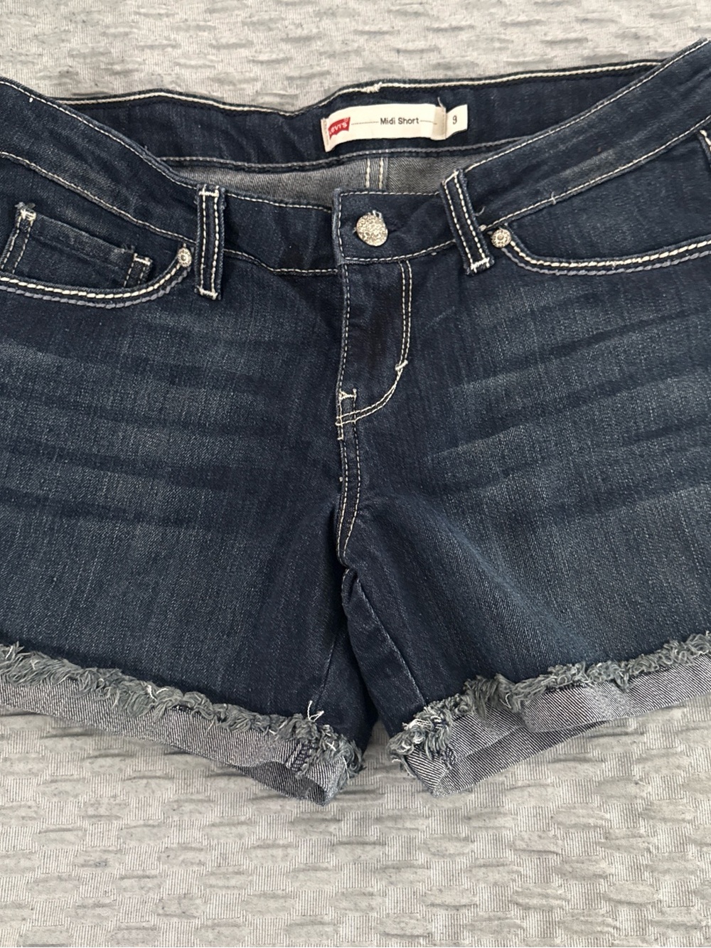 Levi's Indigo Frayed Hem Denim Shorts